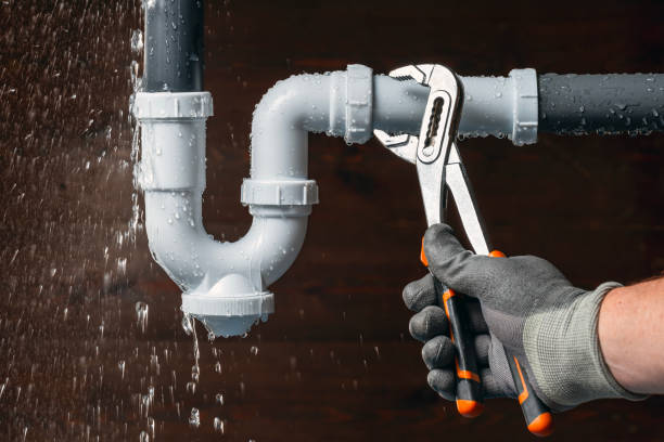 Professional Emergency Plumber technician working in Cutchogue, NY